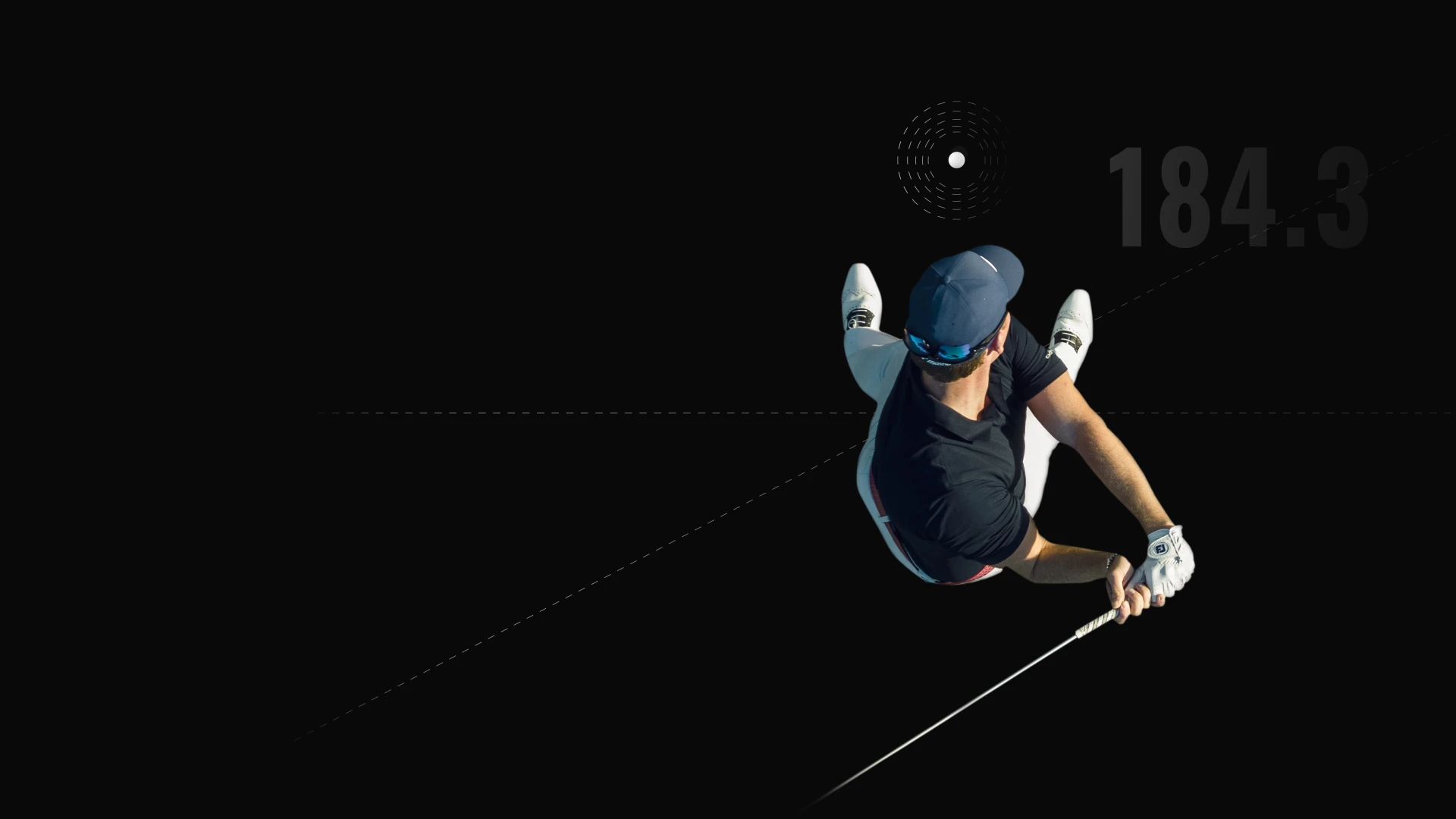 Overhead view of a golfer in mid-swing against a black background, with the number 184.3 displayed.